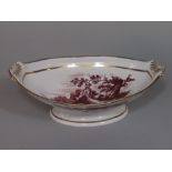 A 19th century bowl of oval form with well painted panel of stags to the interior and with recumbent