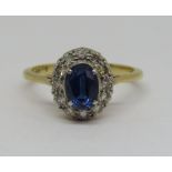 18ct oval sapphire and diamond cluster ring, size P, 3.1g