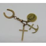 9ct Albert clasp with attached 9ct cross, anchor and horseshoe charms / pendants and yellow metal St