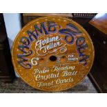 A vintage circular wooden board, with hand painted finish advertising Madame Zola Fortune Teller