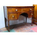 A good quality Georgian mahogany bow fronted side table fitted with an arrangement of drawers around