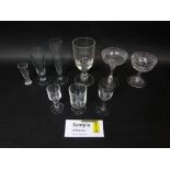 Set of ten cut glass champagnes of elegant form, together with two further star cut champagnes and