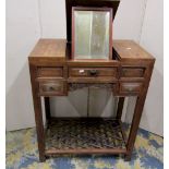 A Chinese dressing table, the central rising cover enclosing a bevelled edge mirror plate flanked by