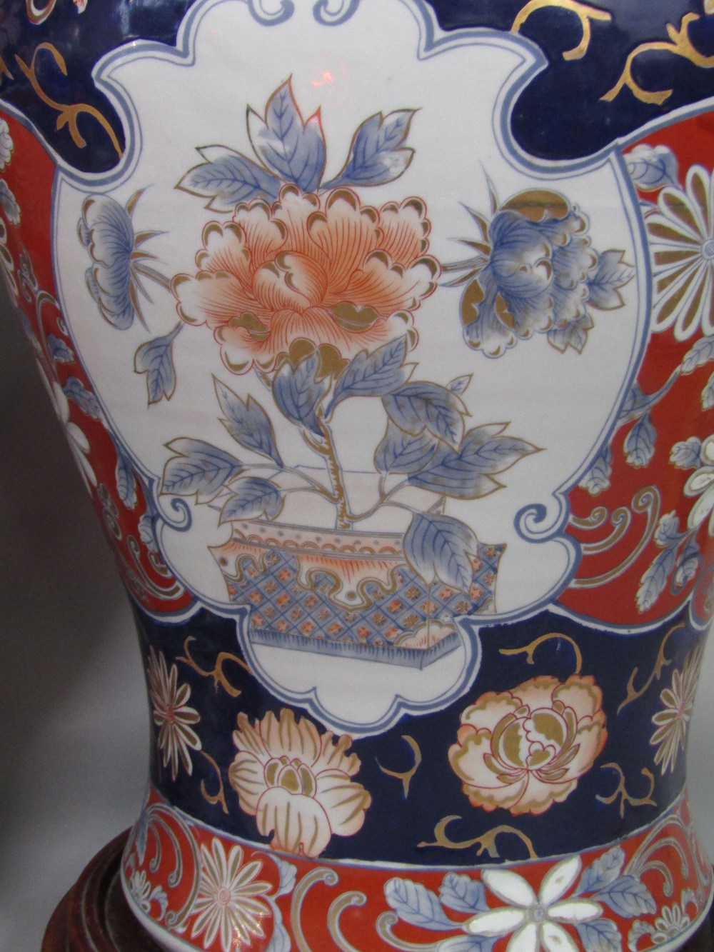 Large pair of Chinese Imari porcelain lidded baluster vases decorated with floral panels, the lids - Image 3 of 3