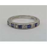 18ct white gold half eternity ring set with princess cut sapphires and round cut diamonds, size O,
