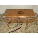 A vintage stitched tan leather suitcase with metal fittings together with a further smaller fibre