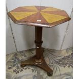 A mid 19th century mixed wood occasional table, the octagonal top 52 cm diameter with alternating