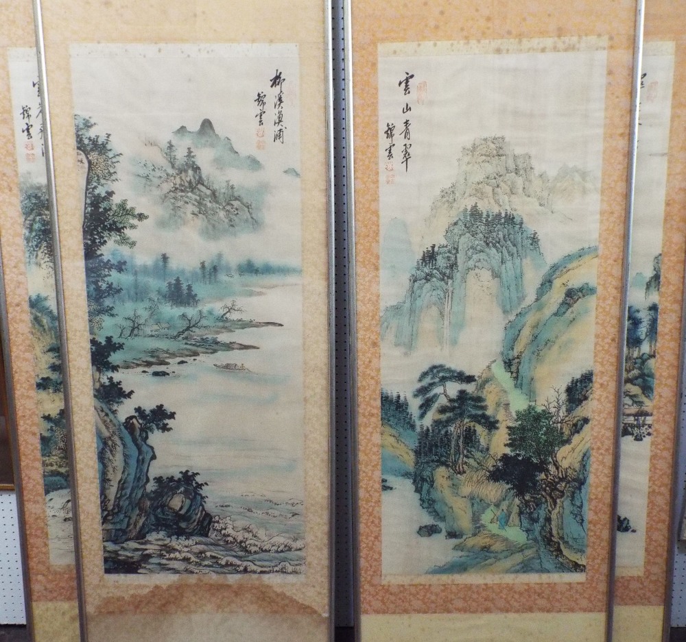 A set of four early 20th century Chinese paintings on fabric of landscapes, probably representing