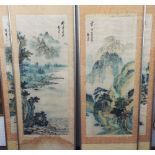 A set of four early 20th century Chinese paintings on fabric of landscapes, probably representing