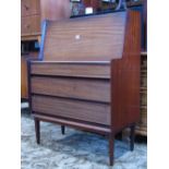 A Richard Hornby Afromosia writing bureau, the fall flap enclosing a simply fitted interior of two