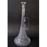 Novelty glass decanter in the form of a trumpet, with parquet type engraved decoration, 55cm high