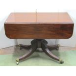 A Georgian mahogany Pembroke breakfast table with drop leaves, single frieze drawer, raised on a