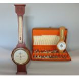 Teak cased canteen of vintage cutlery together with two barometers (3)