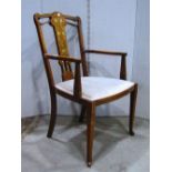 An inlaid Edwardian mahogany lightweight open elbow chair, with foliate detail and upholstered pad