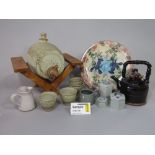 A collection of studio pottery wares including a pair of Tain Pottery plates in the Shandwick