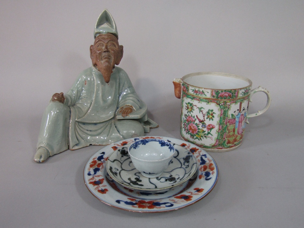 An unusual 19th century Cantonese jug of wide cylindrical form with polychrome painted figure and