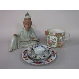 An unusual 19th century Cantonese jug of wide cylindrical form with polychrome painted figure and