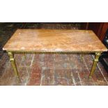 A mid 20th century occasional table, the rectangular marble top raised on a brass framework with