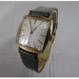 Gents 9ct Omega automatic De Vill wristwatch, the champagne dial with baton markers upon a period