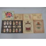 A collection of six cigarette card albums including The Kensitas Albums of National Flags and a