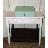 A 19th century pine side table fitted with a shallow frieze drawer raised on ring turned and tapered