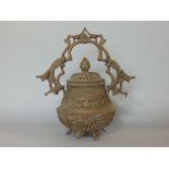 Good quality Chinese pierced bronze baluster lidded cauldron, the hoop handle cast with dragons