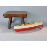 Vintage Sutcliffe model boat 'Minx' in cream and red, together with a small hardwood stool, height