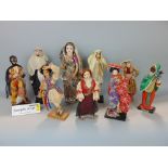 Large collection of vintage dolls in worldwide costumes, together with further novelty dolls from