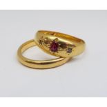 18ct wedding ring, size M and an 18ct ruby and diamond gypsy ring, size N (cut), 6.2g total (2)