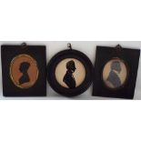 A collection of three 19th century profile silhouette portrait miniatures. comprising a young lady