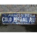 A vintage enamel sign (remains, one half) advertising Arnold Perrett Gold Medal Ales, Wickwar