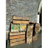 Eleven wooden fruit crates, including nine two divisional examples, two bearing original paper