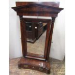 A substantial early 19th century mahogany dressing mirror, the box base of convex form enclosing a