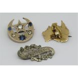 Australian kangaroo brooch stamped '9W', 2g, together with a star and crescent brooch in unmarked