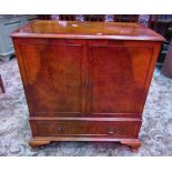 A TV cabinet in the form of a Georgian style side cupboard, with well matched walnut veneers,