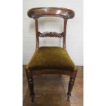 A set of six late Regency mahogany dining chairs, with carved and scrolled splats, cresting rails