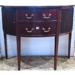 A late 19th century Georgian style mahogany bow-fronted side table fitted with two central long