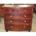 A Victorian mahogany bow-fronted bedroom chest of two short over three long graduated drawers,