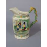 A Fieldings Crown Devon musical jug, with relief moulded figures of Welsh characters and Welsh poem,