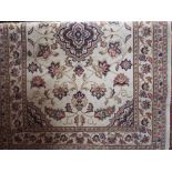 Turkish rug decorated with typical foliage upon a cream ground, 180 x 120 cm