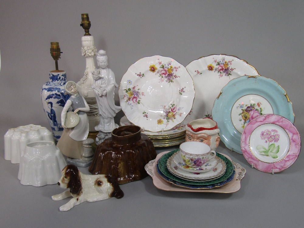 A collection of 19th century and later ceramics including an oriental blue and white lamp base