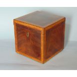 Georgian mahogany and satinwood cross banded tea caddy, the hinged lid enclosing a further lidded