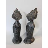 Tribal interest - interesting pair of cast bronze male and female tribe people, 20 cm high
