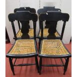 A set of four Regency cottage dining chairs with original painted gilt lined detail with vase shaped