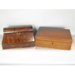 A good quality burr walnut writing slope, with domed hinged top enclosing two ceramic inkwells and