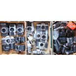 Three boxes of mixed 35mm cameras and others to include Minolta, Praktica, Pentax, etc (over 30)