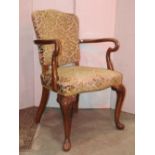 A pair of Georgian style open elbow chairs with cut floral moquet patterned upholstered seats and