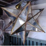 A contemporary star cluster shaped hanging ceiling light with segmented mirror panels