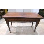 A Gothic revival pitch pine table of rectangular form, possibly of ecclesiastical origin, with