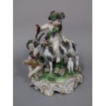 A good quality 19th century continental figure group of a pair of Bacchanalian cherubs, one riding